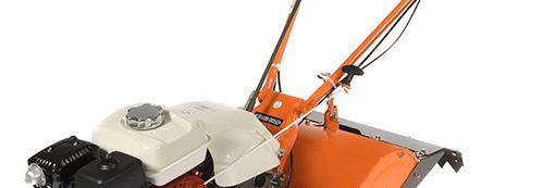 Orangefarbener Gartenfräse von der Seite